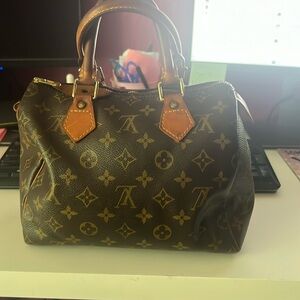 Worn authentic Louis Vuitton Speedy 25